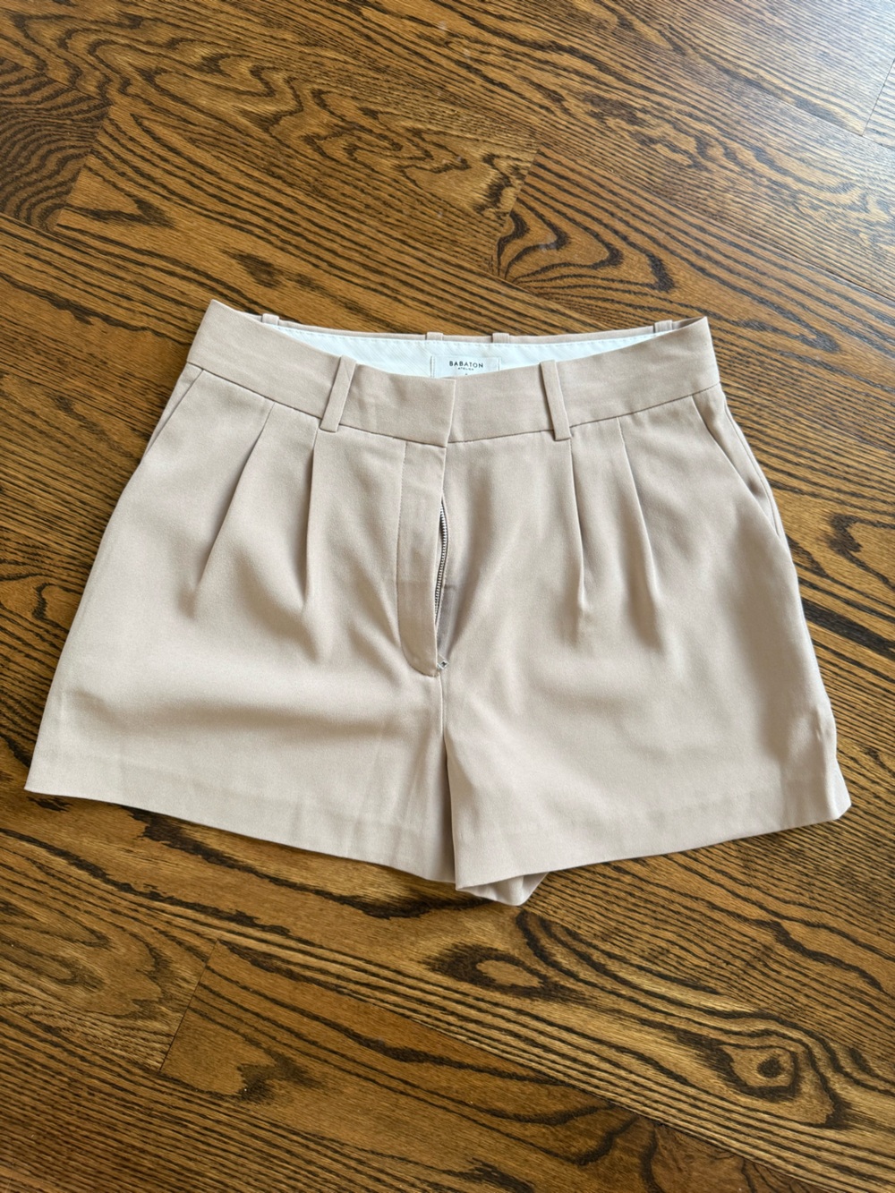 Babaton High-Waist Pleated Shorts in Light Beige